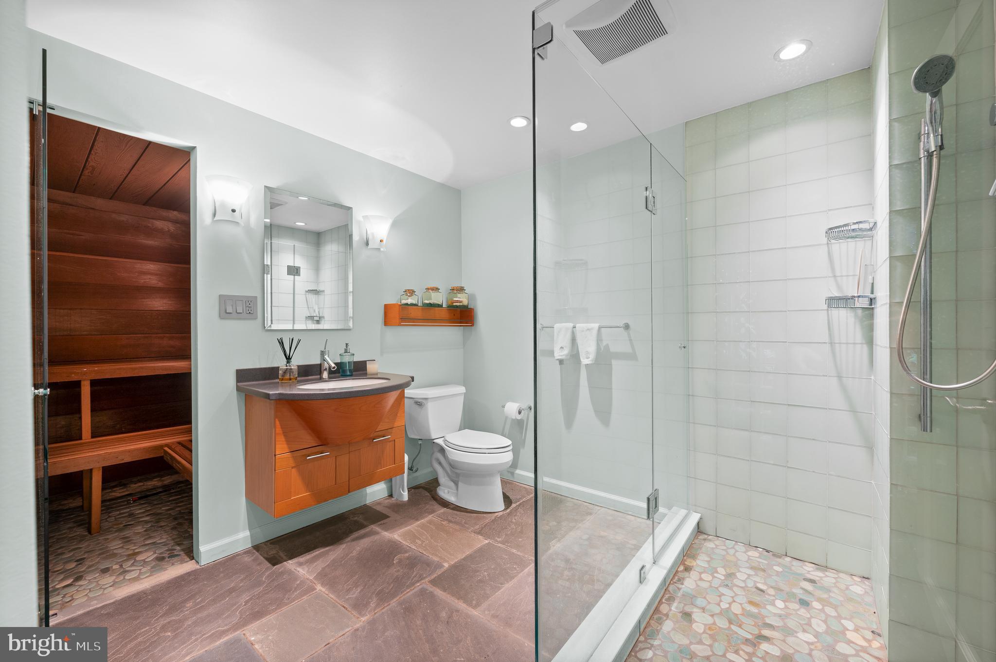 590 Fletcher Road Wayne, PA 19087 - Photo 33 of 44 a bathroom with a toilet a sink and shower