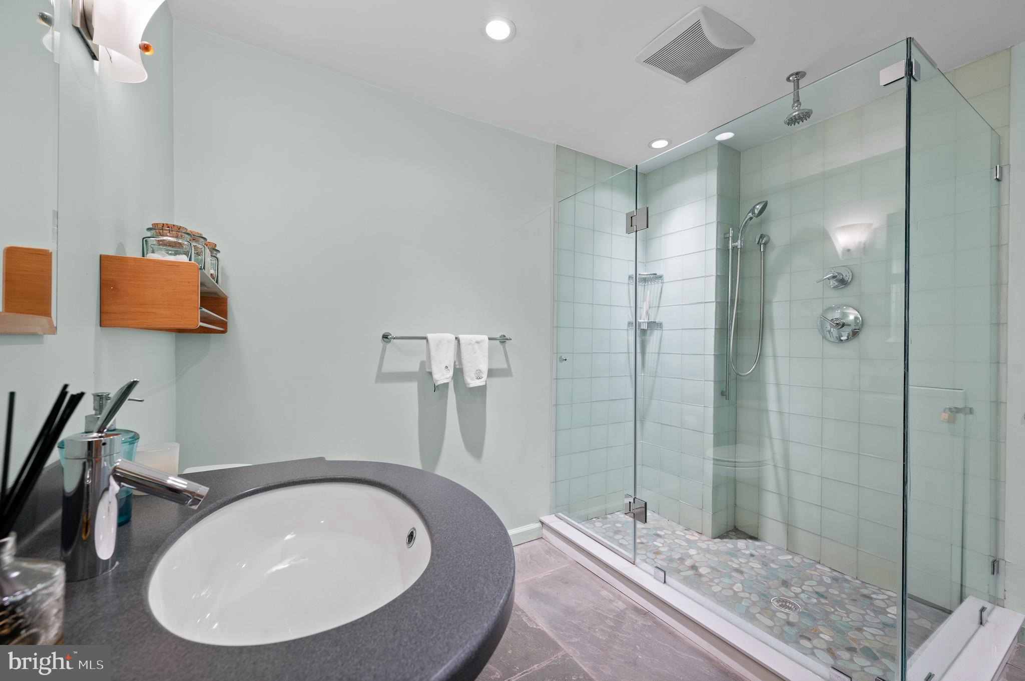 590 Fletcher Road Wayne, PA 19087 - Photo 34 of 44 a bathroom with a sink and a mirror