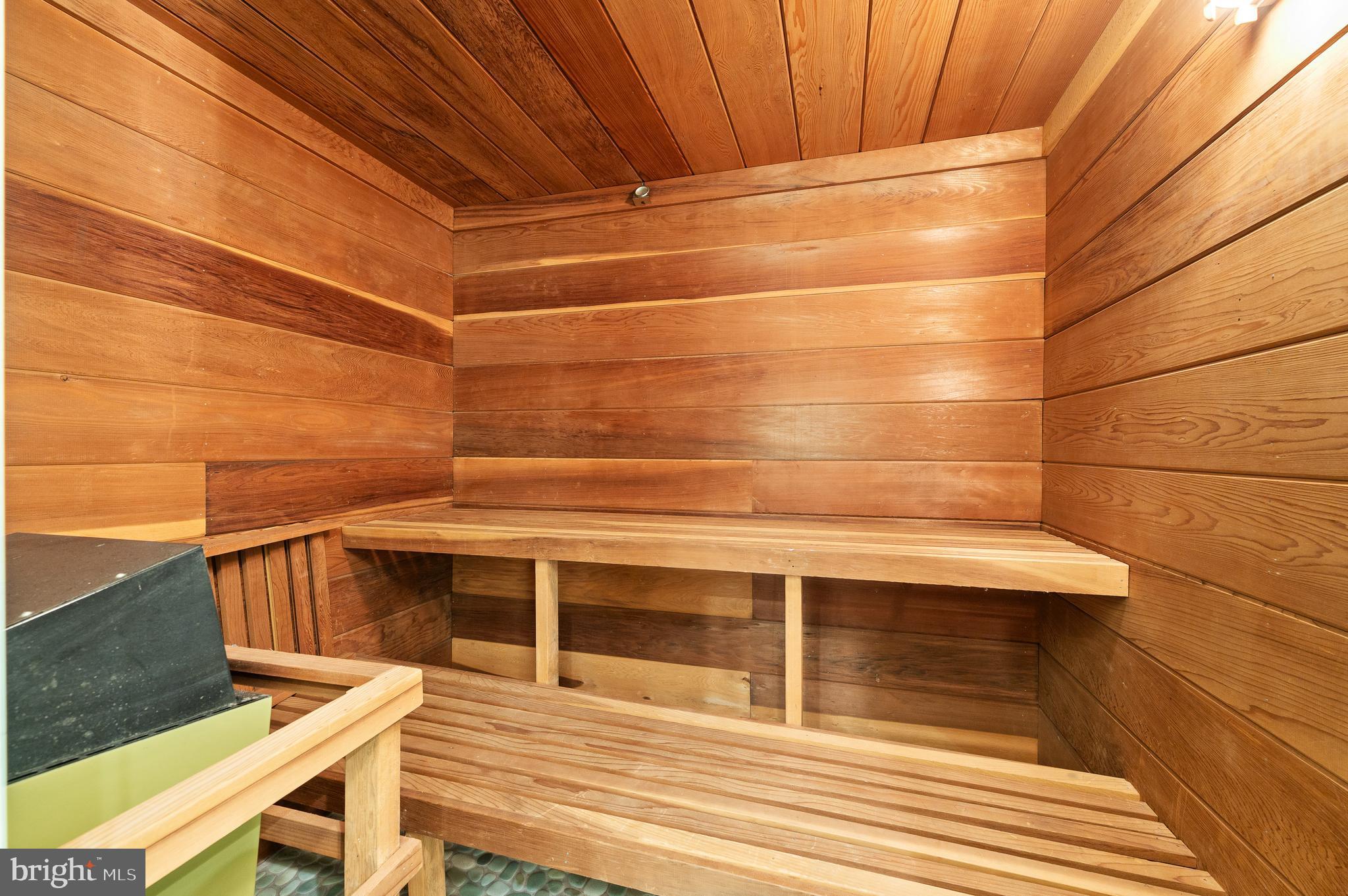 590 Fletcher Road Wayne, PA 19087 - Photo 35 of 44 a view of a balcony with two chairs and wooden floor