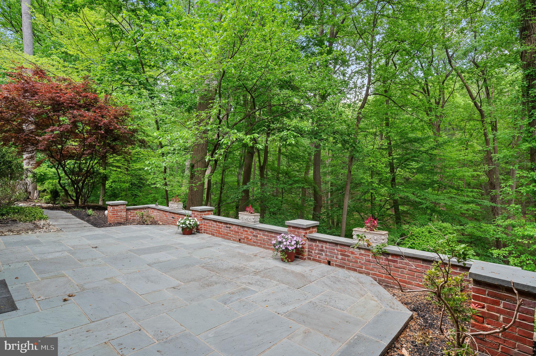590 Fletcher Road Wayne, PA 19087 - Photo 37 of 44 a view of a road with a bench in the background