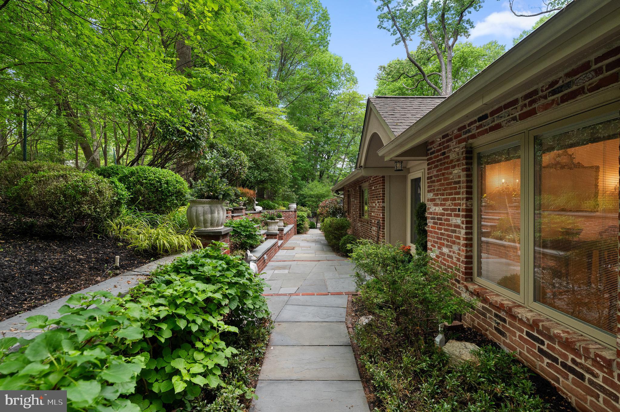 590 Fletcher Road Wayne, PA 19087 - Photo 4 of 44 a view of a pathway with a house