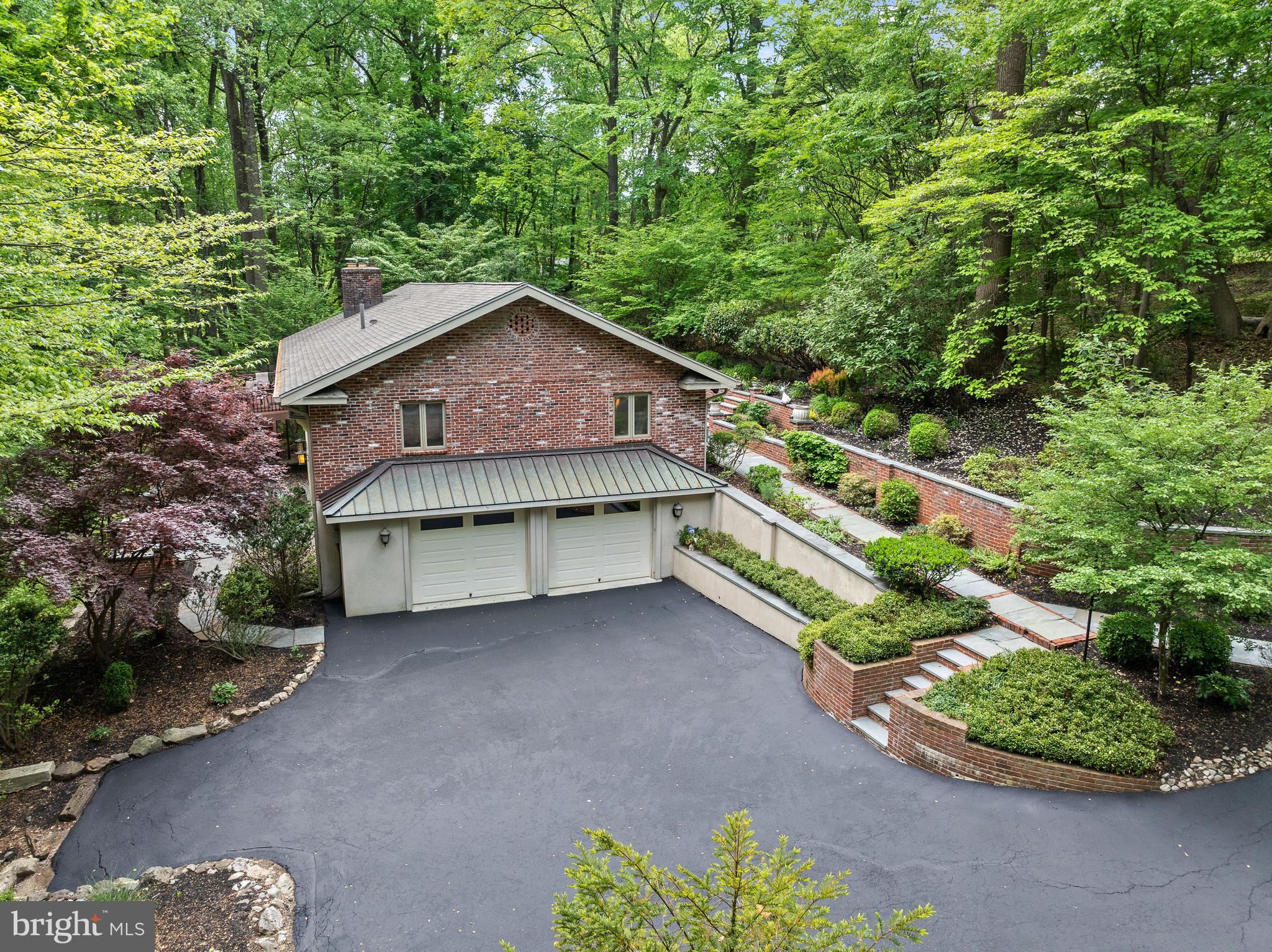 590 Fletcher Road Wayne, PA 19087 - Photo 41 of 44 a house view with a garden space