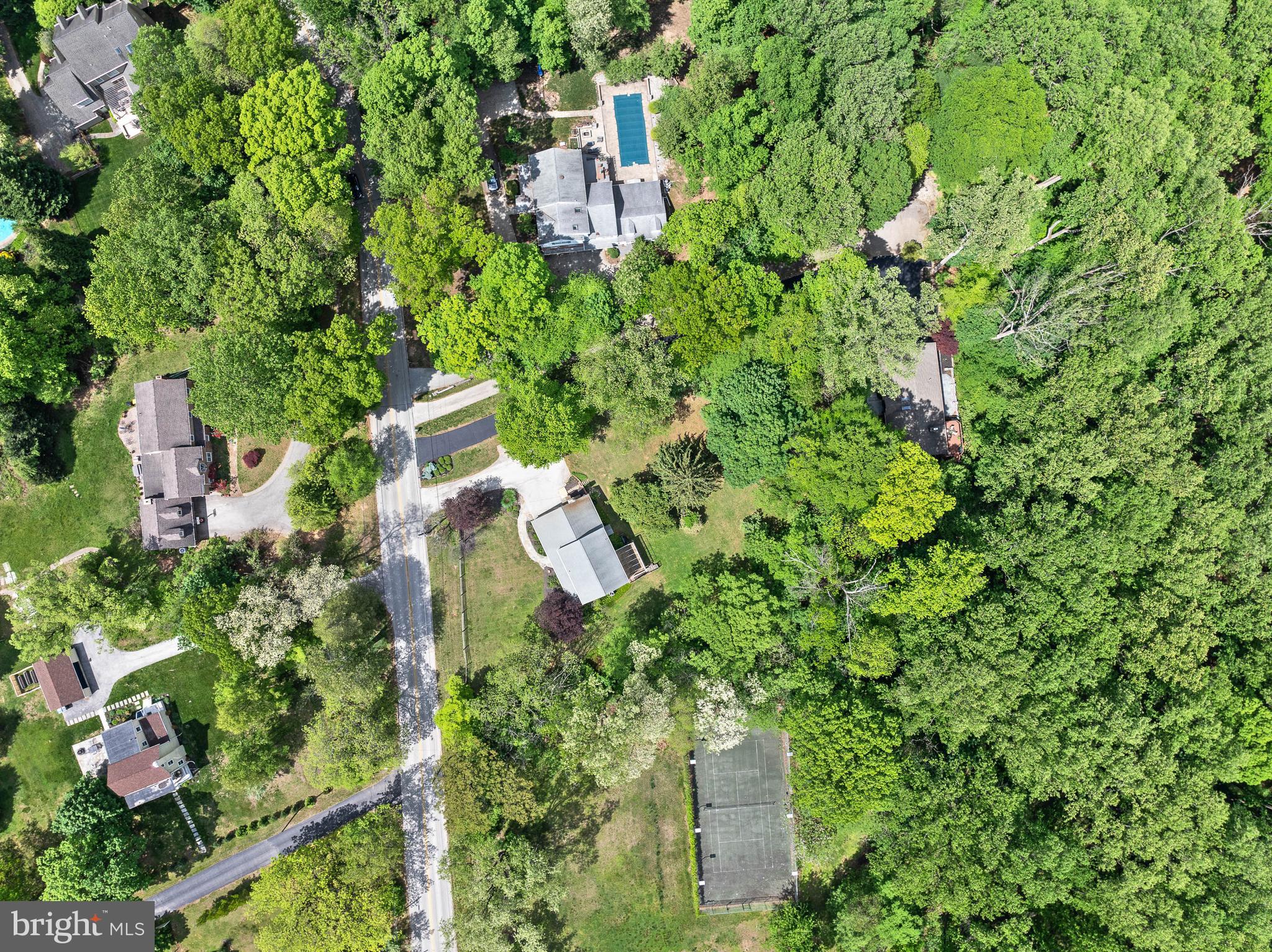 590 Fletcher Road Wayne, PA 19087 - Photo 44 of 44 an aerial view of residential house with outdoor space and trees all around