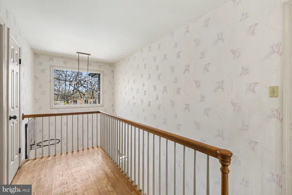 a view of entryway with wooden floor
