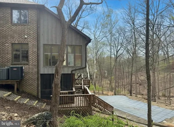a view of house with yard