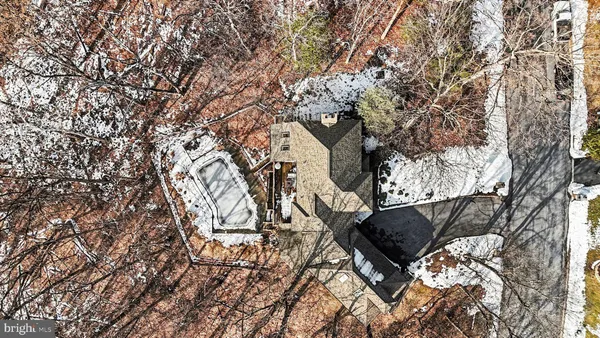 a view of a house with a tree