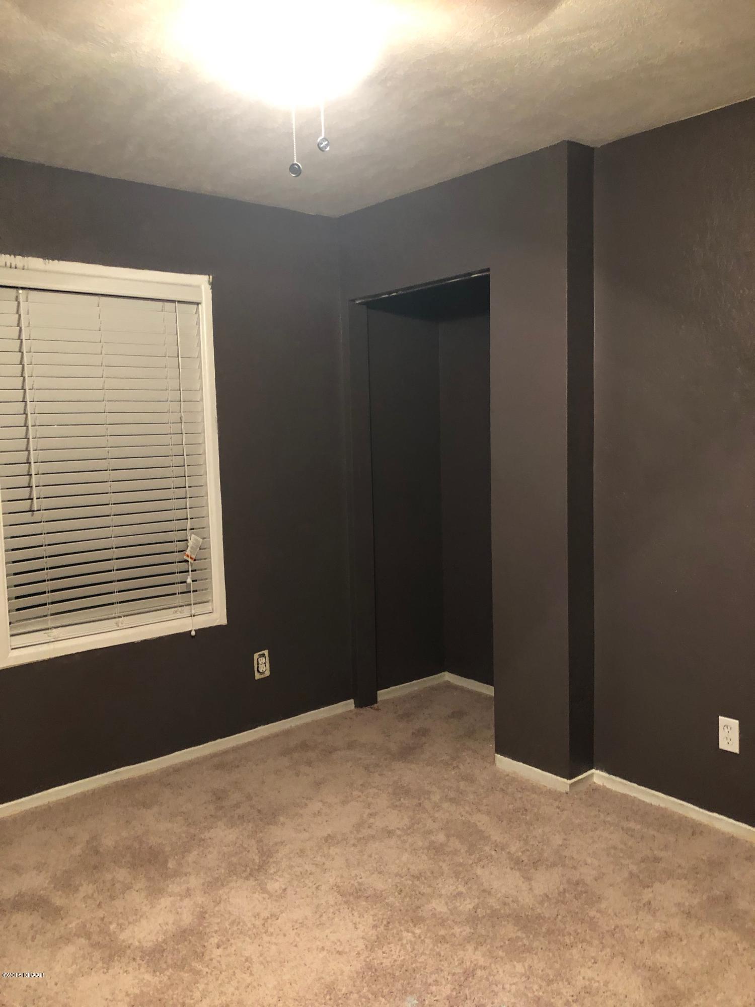 1417 Constantine Street Orlando, FL 32825 - Photo 12 of 14 a view of a room with a window