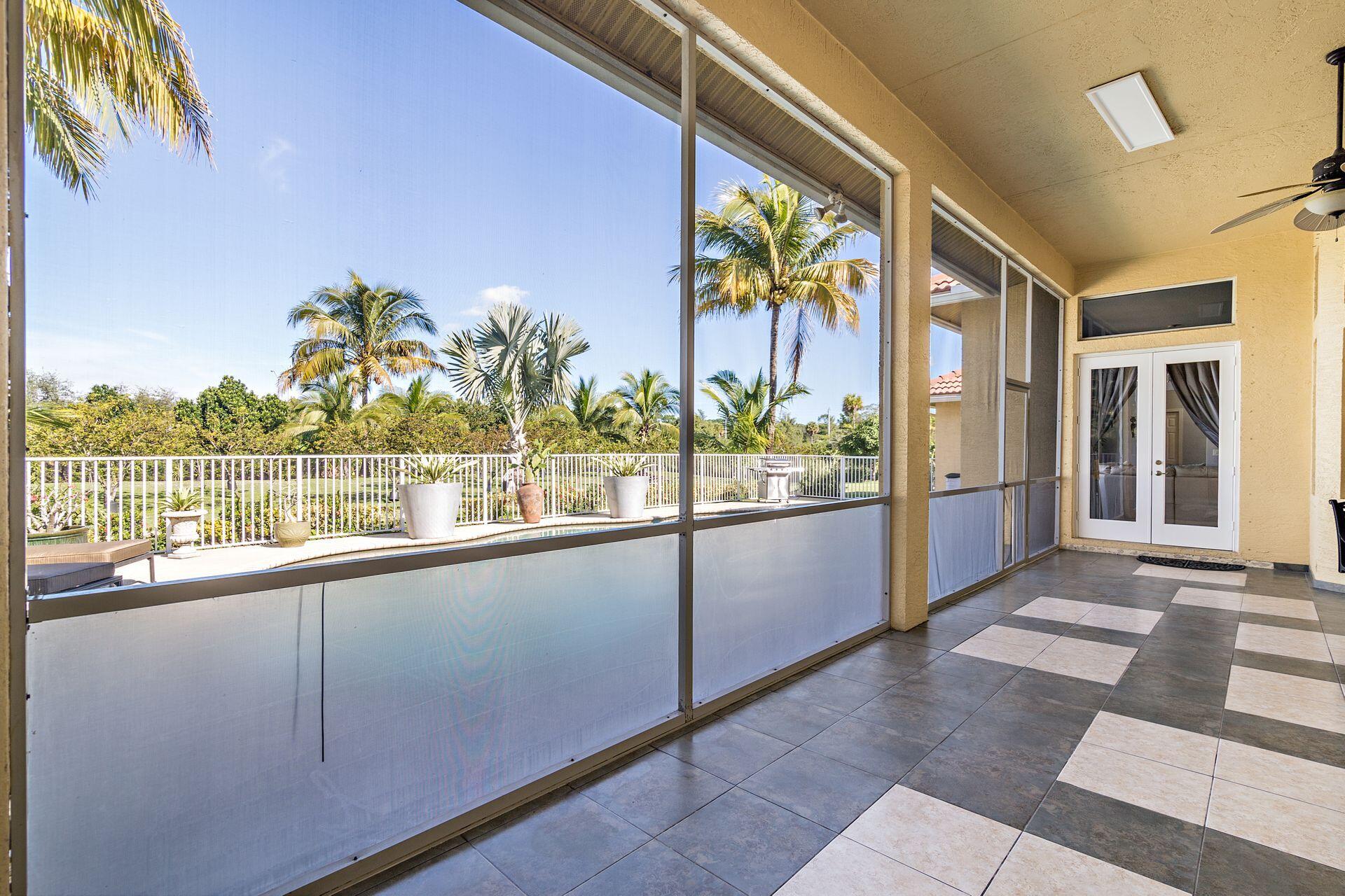 6813 Wilson Road West Palm Beach, FL 33413 - Photo 24 of 26 a view of a balcony with furniture