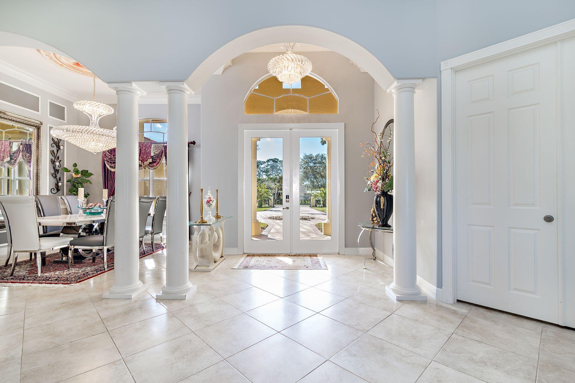 6813 Wilson Road West Palm Beach, FL 33413 - Photo 4 of 26 a view of a entryway door with interior