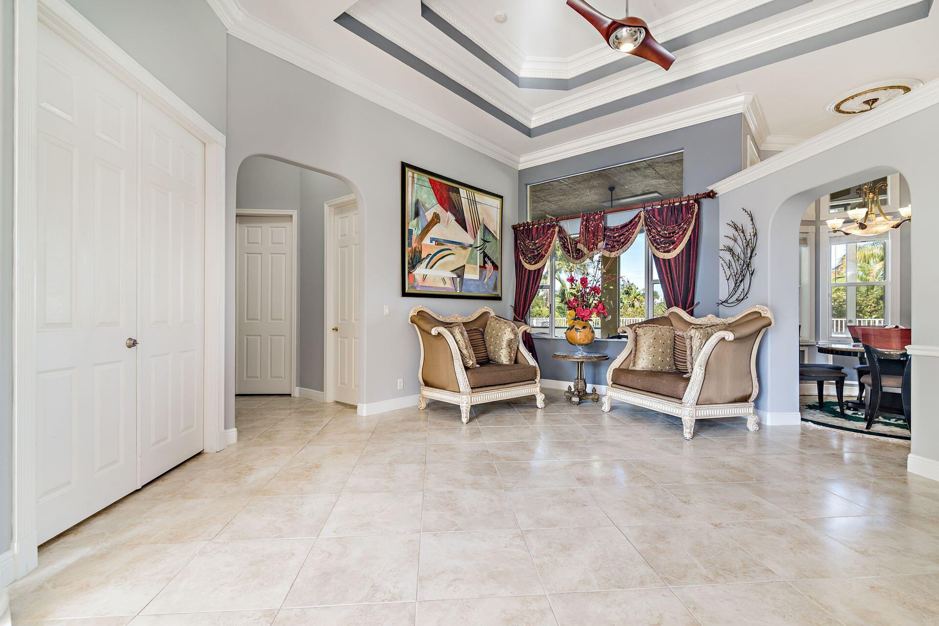 6813 Wilson Road West Palm Beach, FL 33413 - Photo 5 of 26 a view of a room with chairs