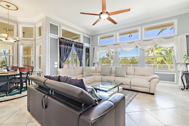 a living room with furniture and windows