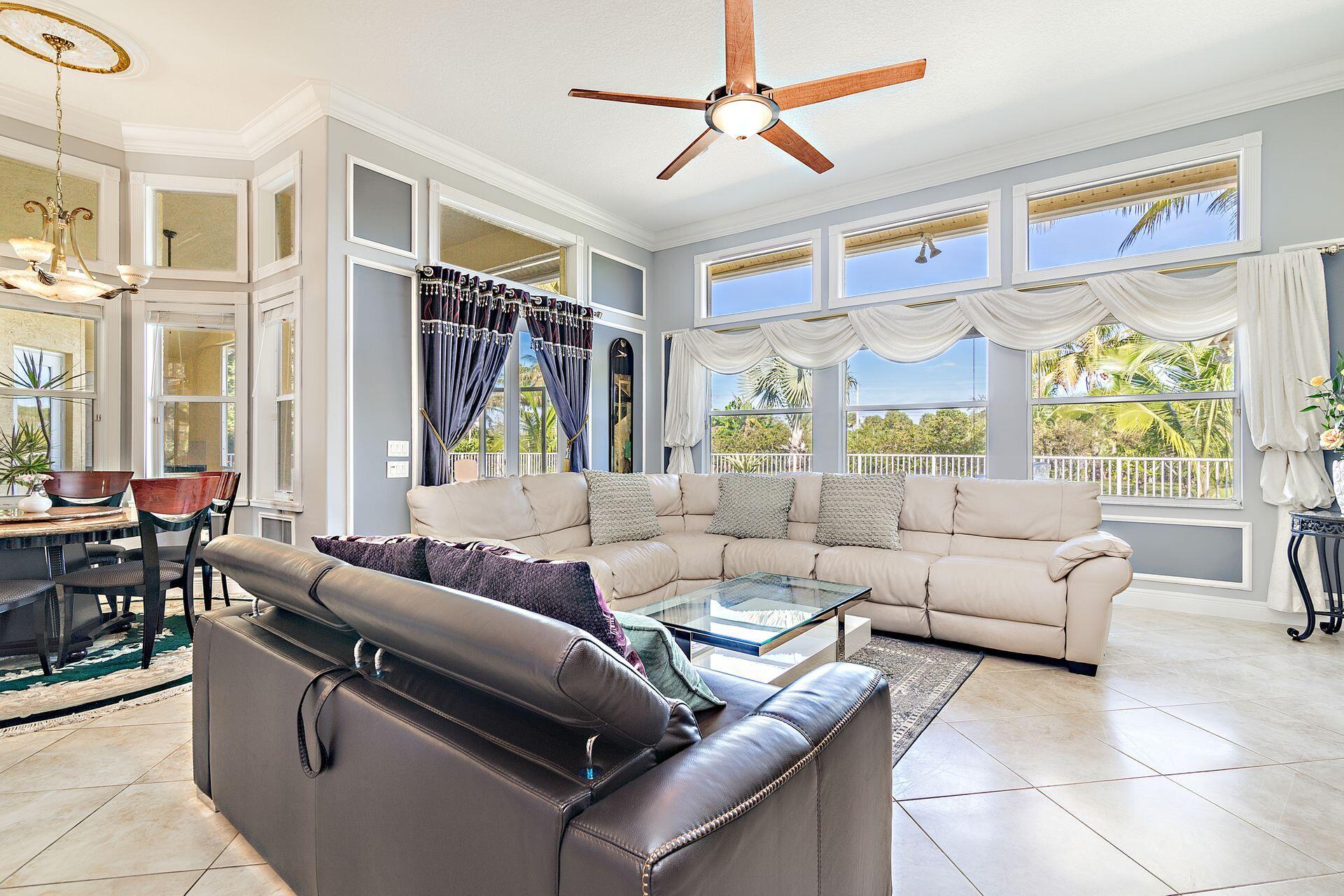6813 Wilson Road West Palm Beach, FL 33413 - Photo 7 of 26 a living room with furniture and windows