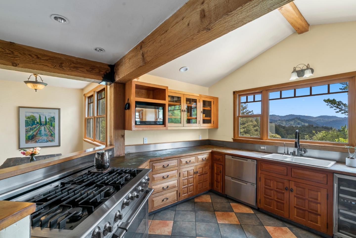 787 Rider Ridge Road Santa Cruz, CA 95065 - Photo 13 of 39 a kitchen with a stove a sink and a granite counter top