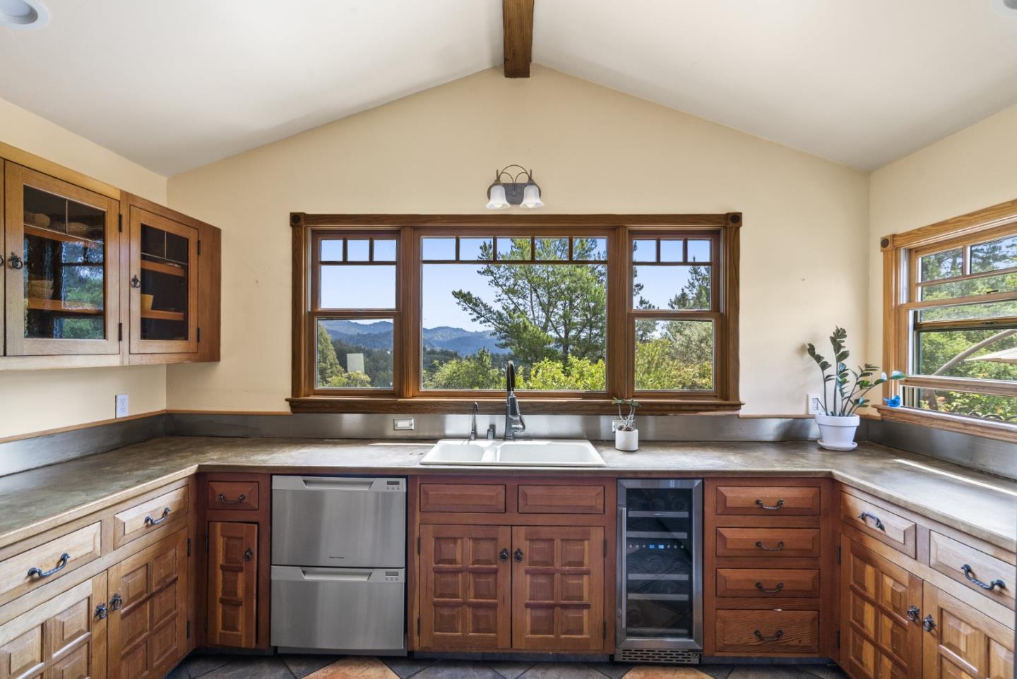787 Rider Ridge Road Santa Cruz, CA 95065 - Photo 14 of 39 a kitchen with granite countertop a sink and a large window