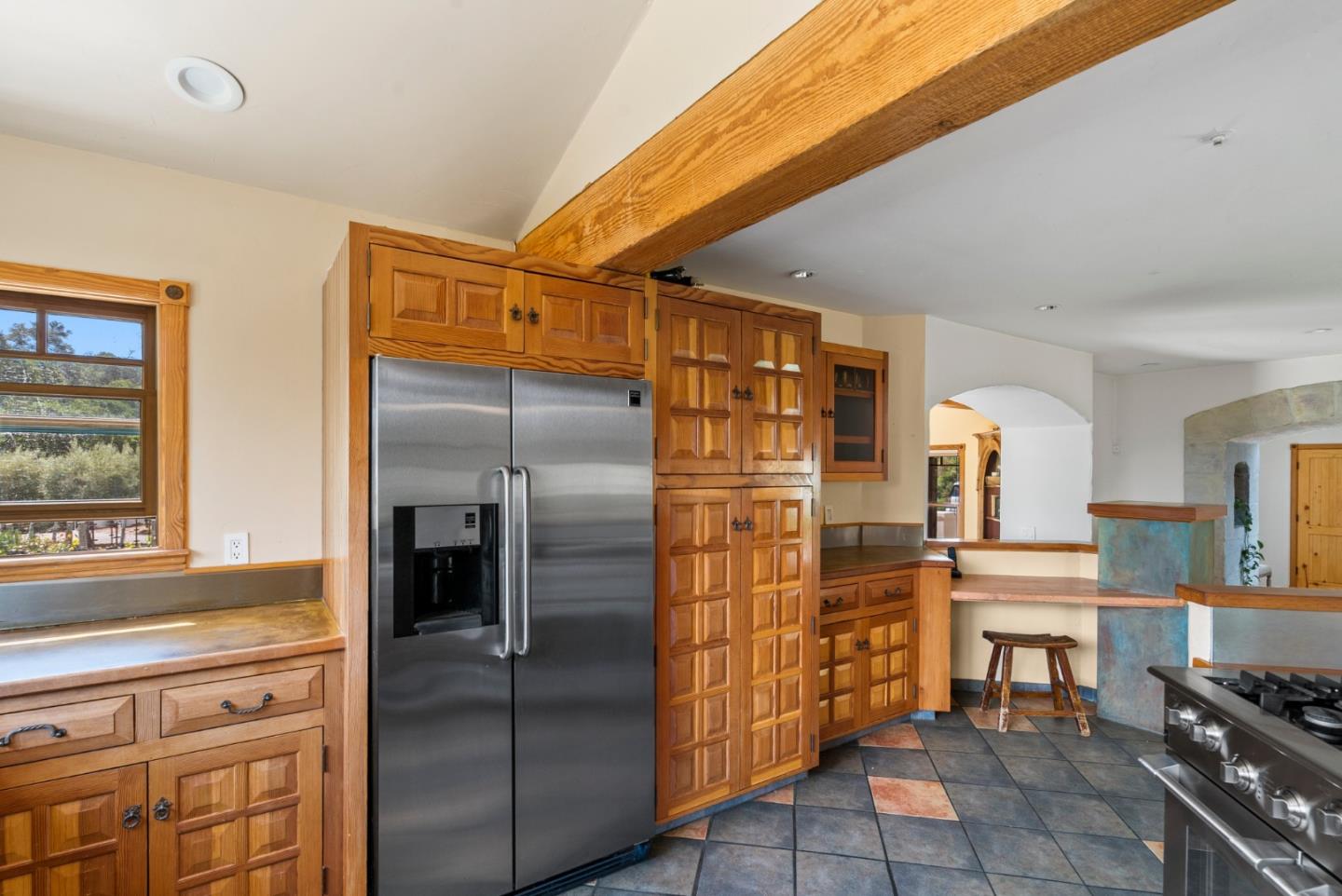 787 Rider Ridge Road Santa Cruz, CA 95065 - Photo 15 of 39 a kitchen with cabinets and stainless steel appliances