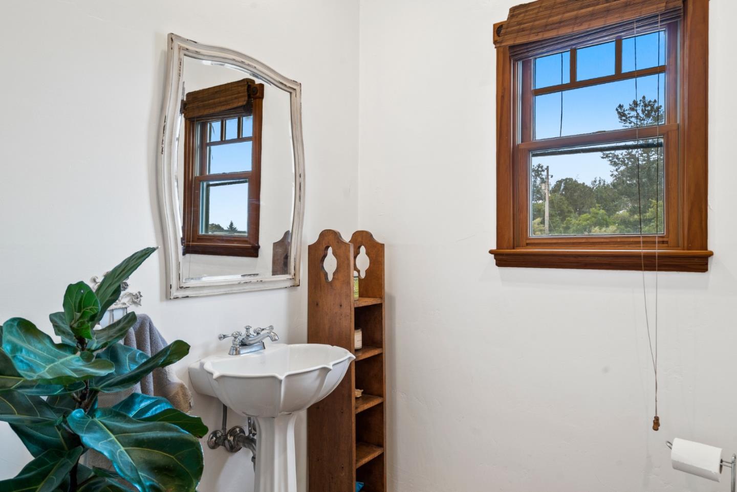 787 Rider Ridge Road Santa Cruz, CA 95065 - Photo 17 of 39 a bathroom with a sink and a mirror