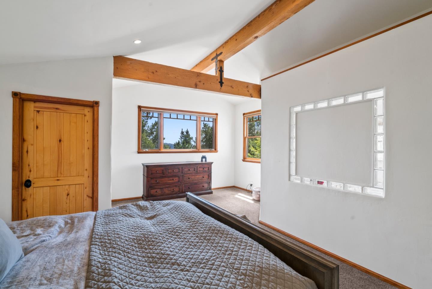 787 Rider Ridge Road Santa Cruz, CA 95065 - Photo 21 of 39 a bedroom with a bed and a painting on the wall