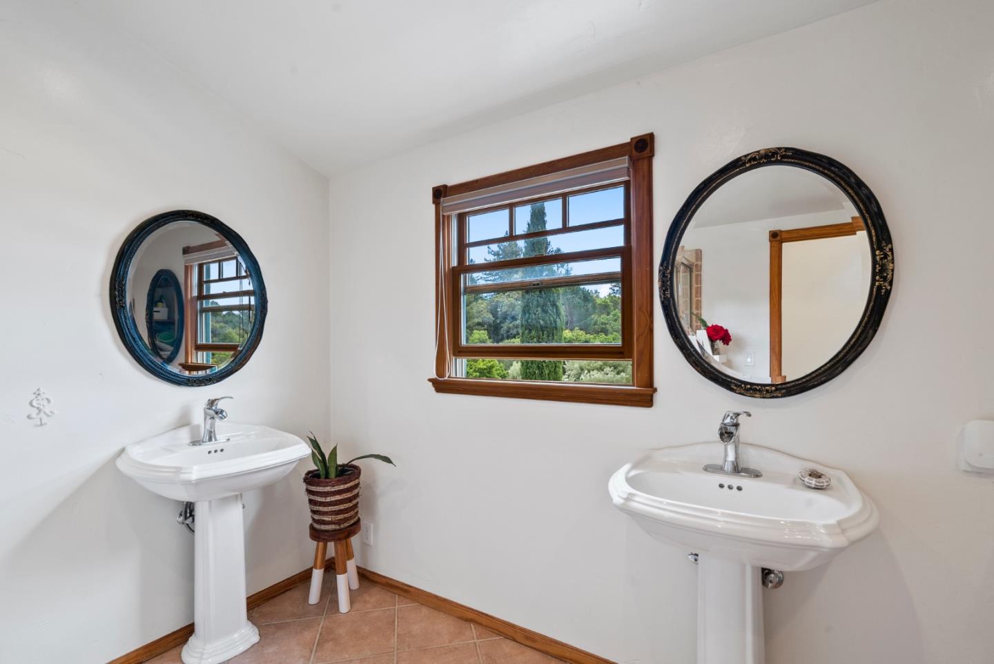 787 Rider Ridge Road Santa Cruz, CA 95065 - Photo 29 of 39 a bathroom with a sink and a mirror