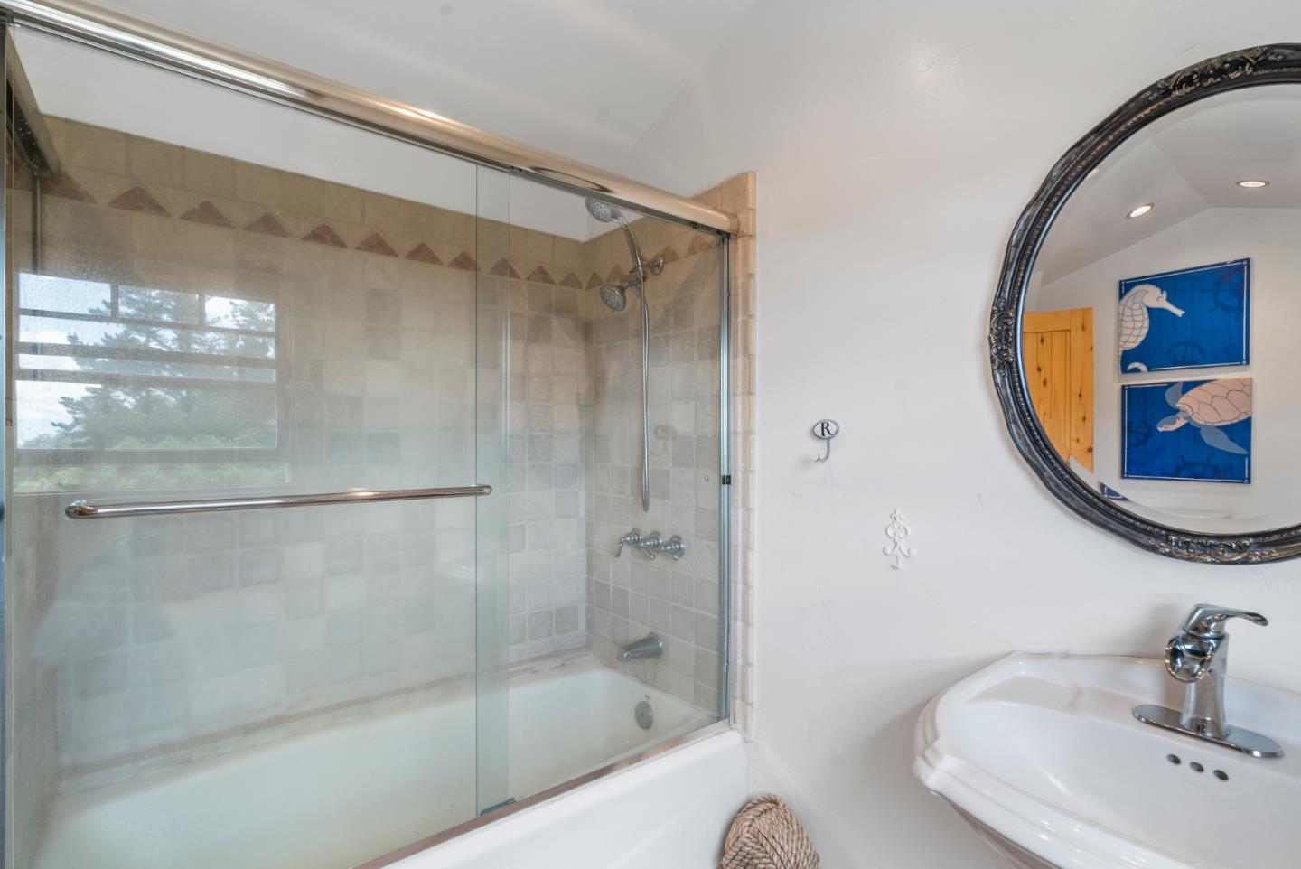 787 Rider Ridge Road Santa Cruz, CA 95065 - Photo 30 of 39 a bathroom with a bath tub and a mirror