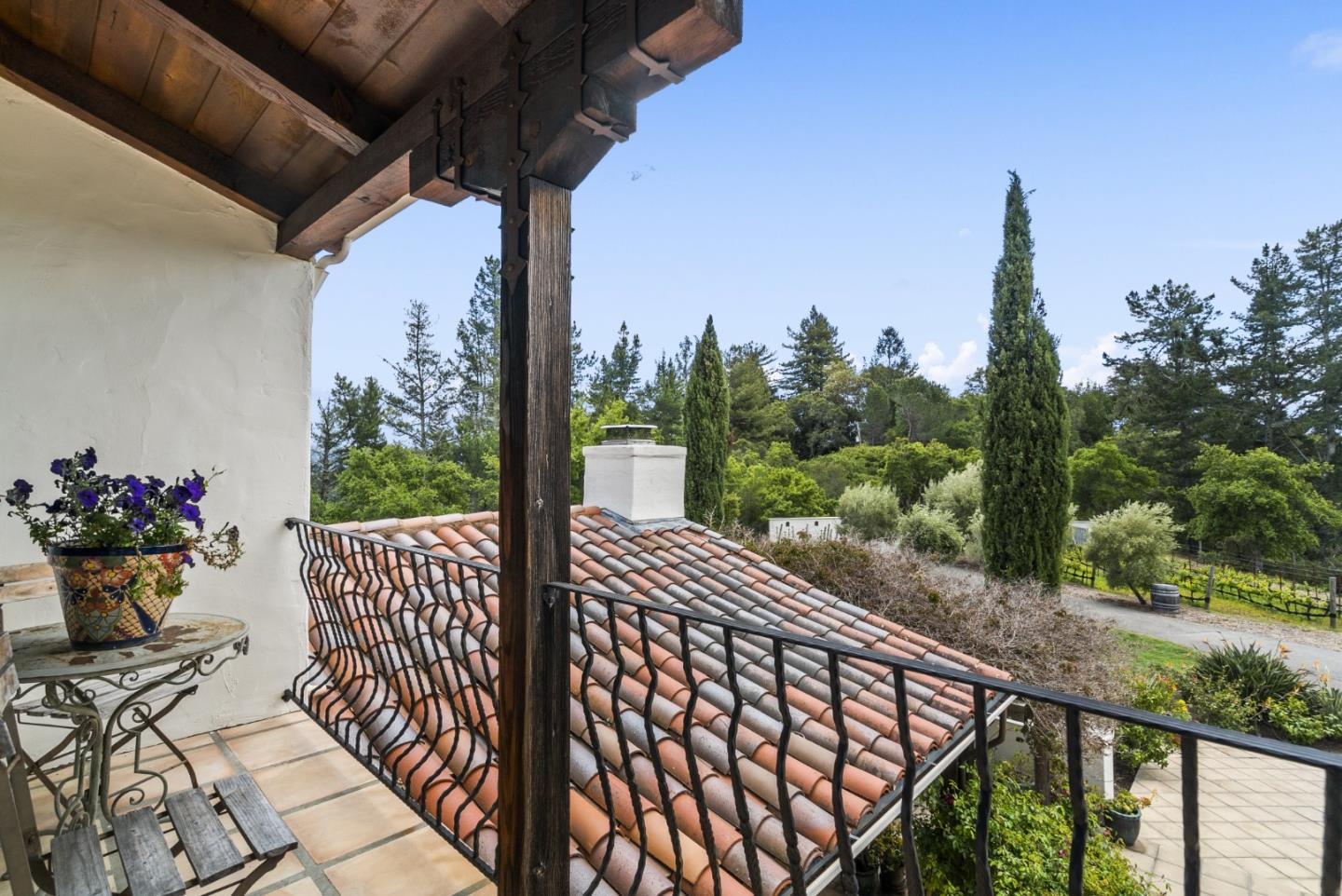 787 Rider Ridge Road Santa Cruz, CA 95065 - Photo 31 of 39 a view of a balcony with wooden chairs