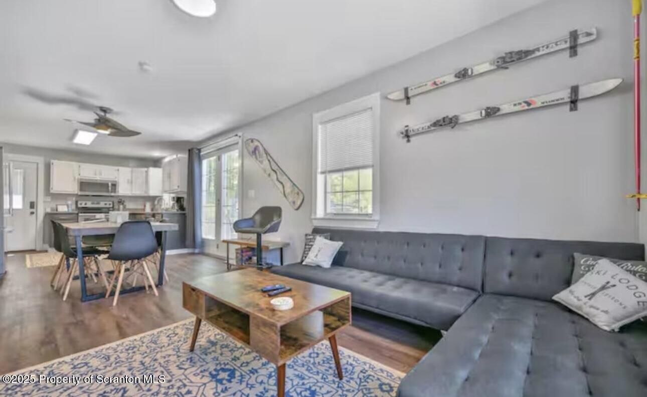 4562 Highway 374 Nicholson, PA 18446 - Photo 19 of 38 a living room with furniture and a large window