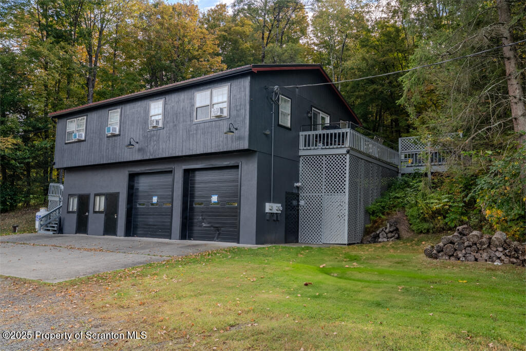 4562 Highway 374 Nicholson, PA 18446 - Photo 2 of 38 a view of a house with backyard and garden