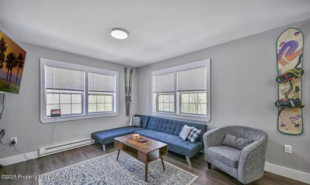 4562 Highway 374 Nicholson, PA 18446 - Photo 23 of 38 a living room with furniture and a window