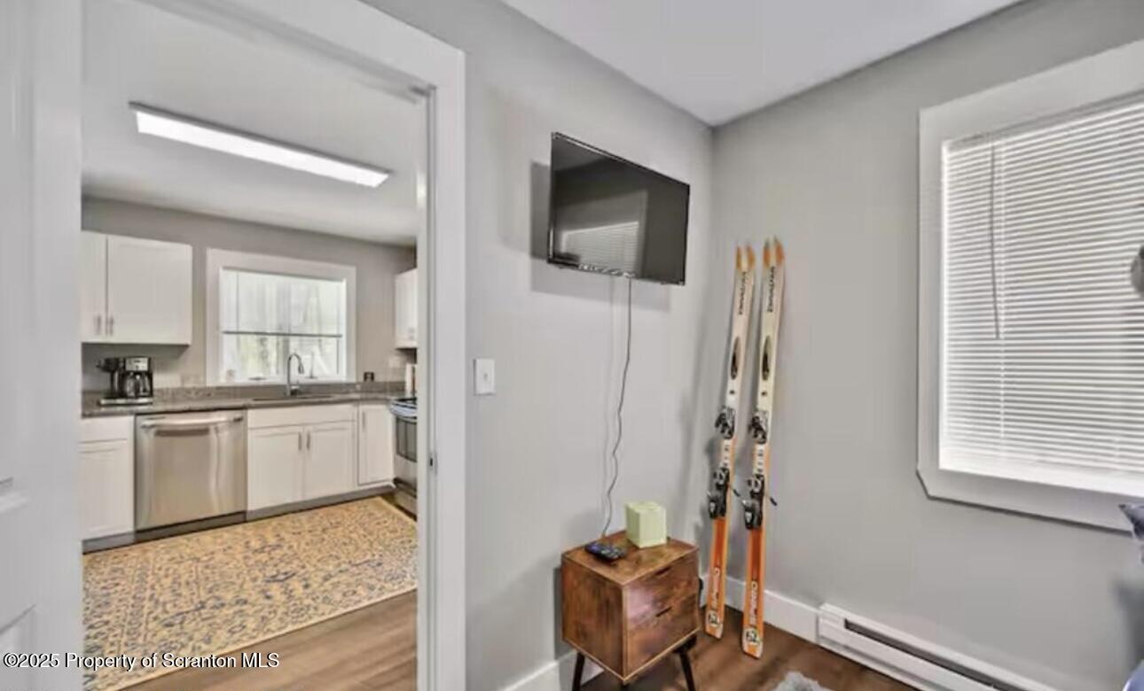4562 Highway 374 Nicholson, PA 18446 - Photo 24 of 38 a kitchen with granite countertop sink and refrigerator