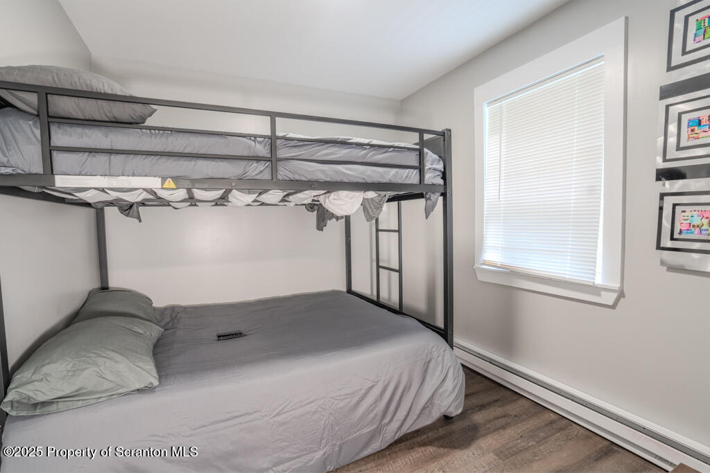 4562 Highway 374 Nicholson, PA 18446 - Photo 29 of 38 a bedroom with a bed and a window