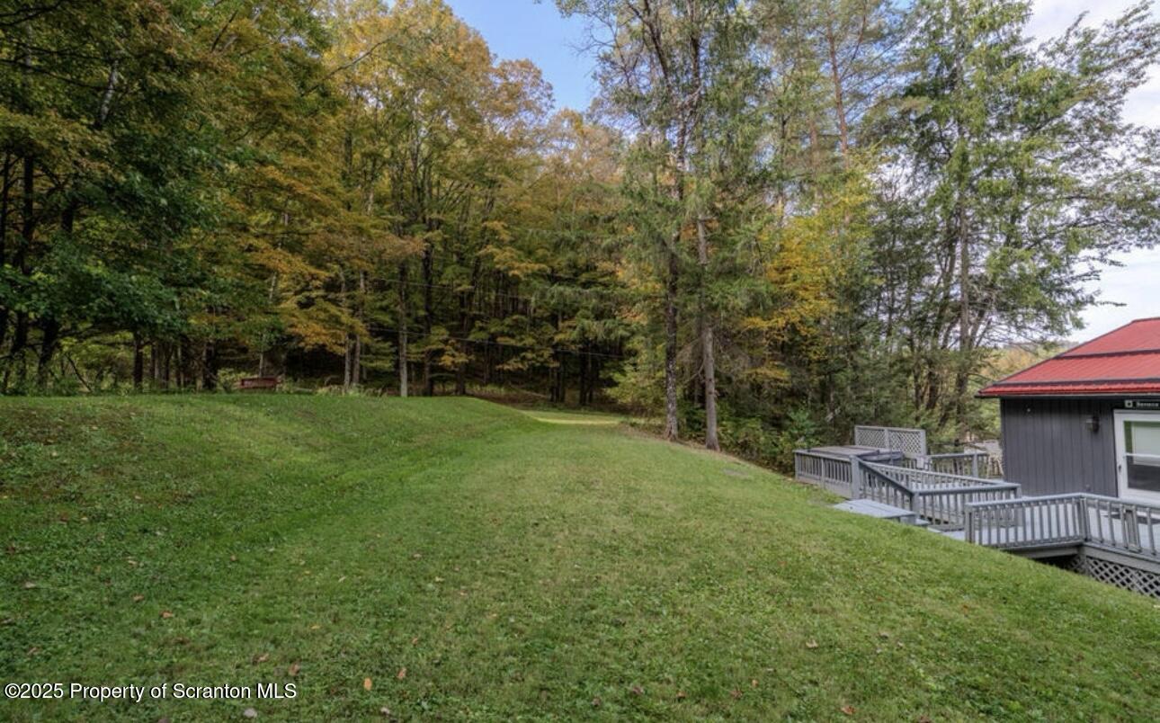 4562 Highway 374 Nicholson, PA 18446 - Photo 36 of 38 a view of a house with a backyard