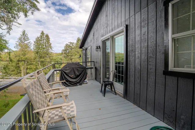 a kitchen with stainless steel appliances granite countertop a refrigerator stove and sink
