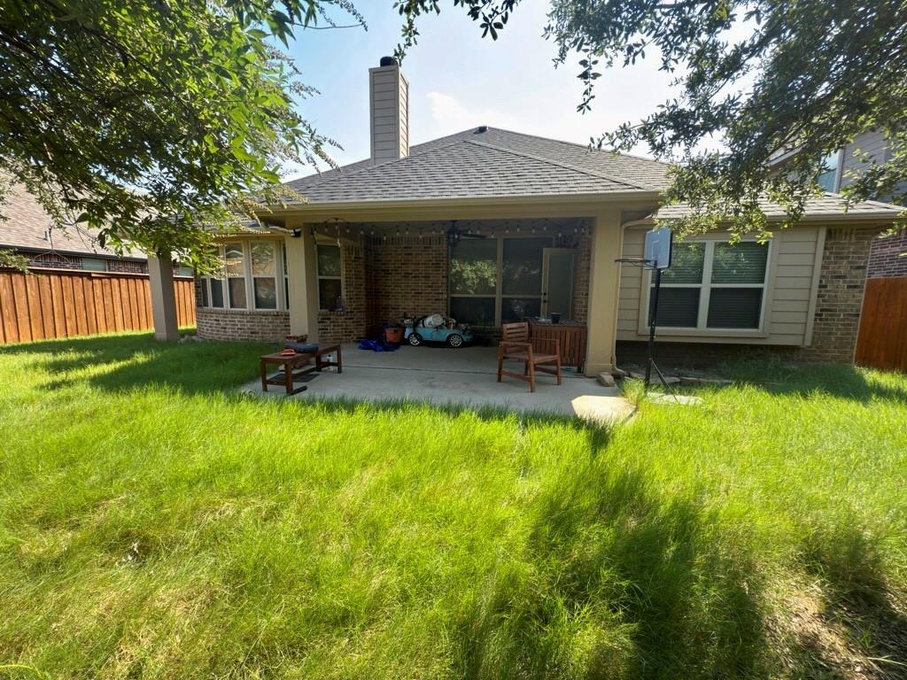 1017 Knoxbridge Road Forney, TX 75126 - Photo 16 of 16 a front view of a house with yard patio and green space