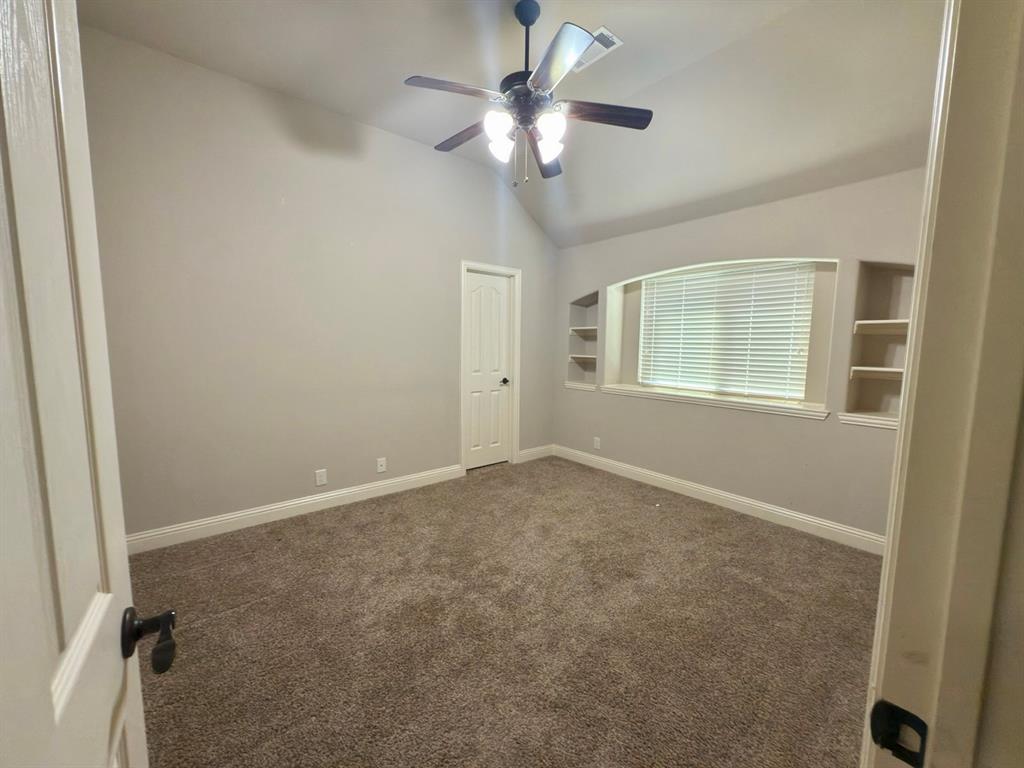 1017 Knoxbridge Road Forney, TX 75126 - Photo 3 of 16 a view of an empty room with a window