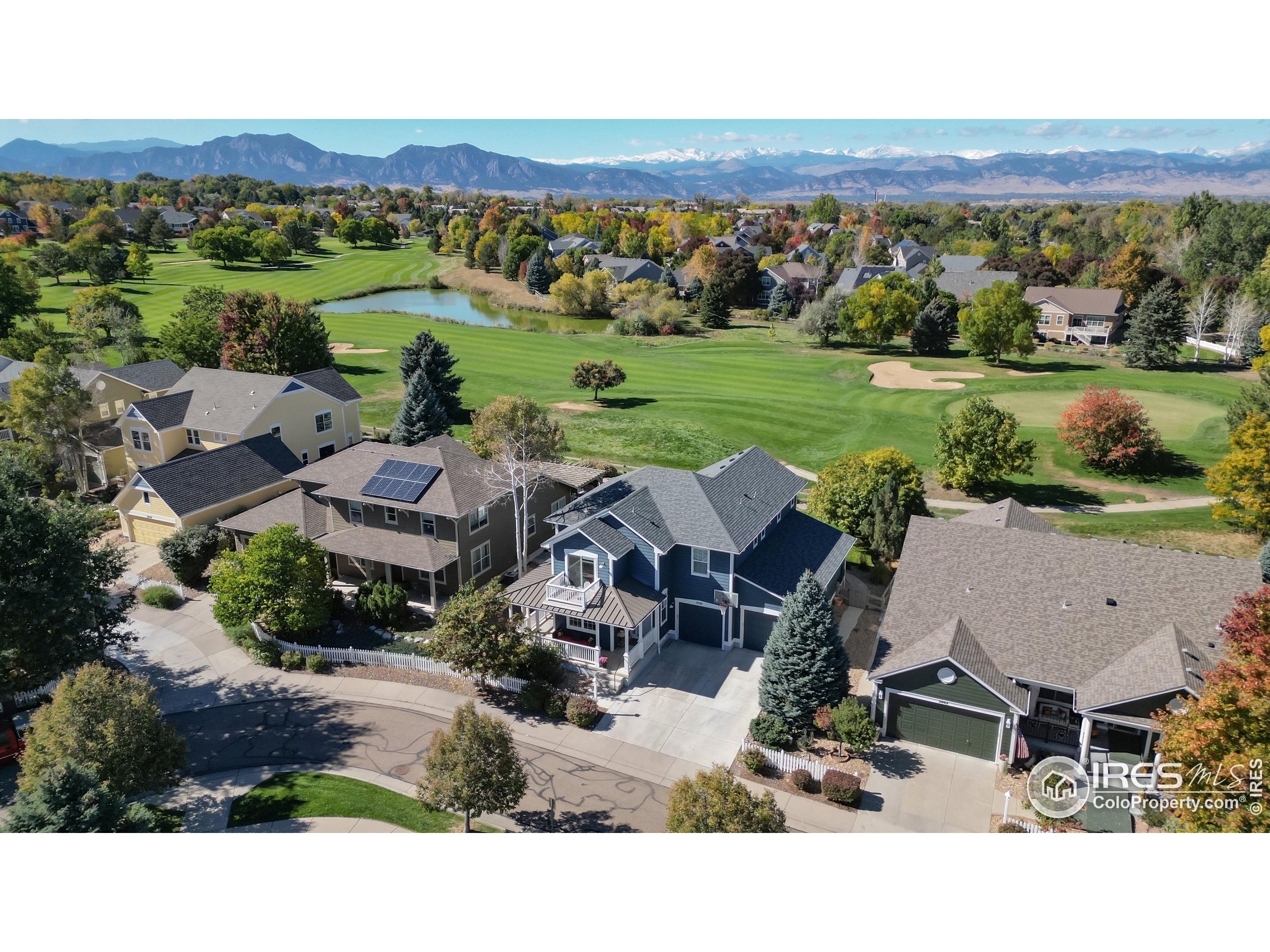 3038 Thunder Lake Circle Lafayette, CO 80026 - Photo 1 of 40 an aerial view of a house with garden and lake view