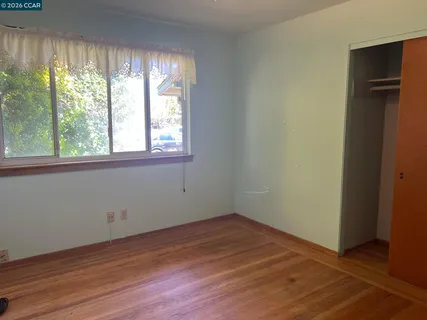 a house with trees in front of it
