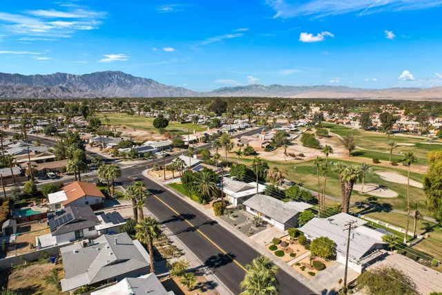 an aerial view of residential building with outdoor space