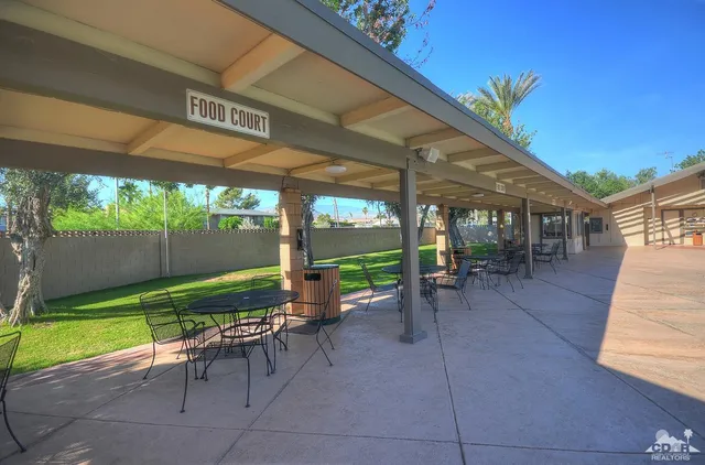 a view of a wrought iron fences in front of house