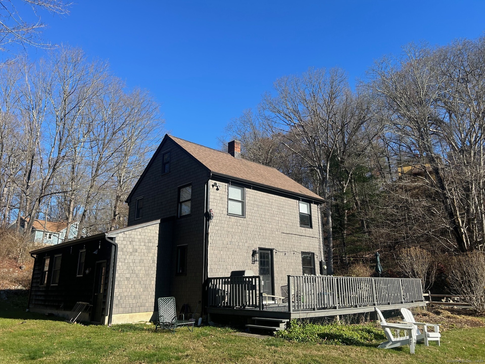 21 Simpaug Turnpike Redding, CT 06896 - Photo 20 of 22 a view of a house with a yard