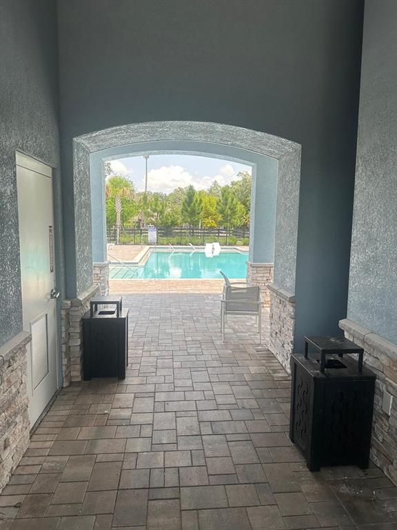 4669 Sparkling Shell Avenue Kissimmee, FL 34746 - Photo 20 of 21 a view of a room with a large window