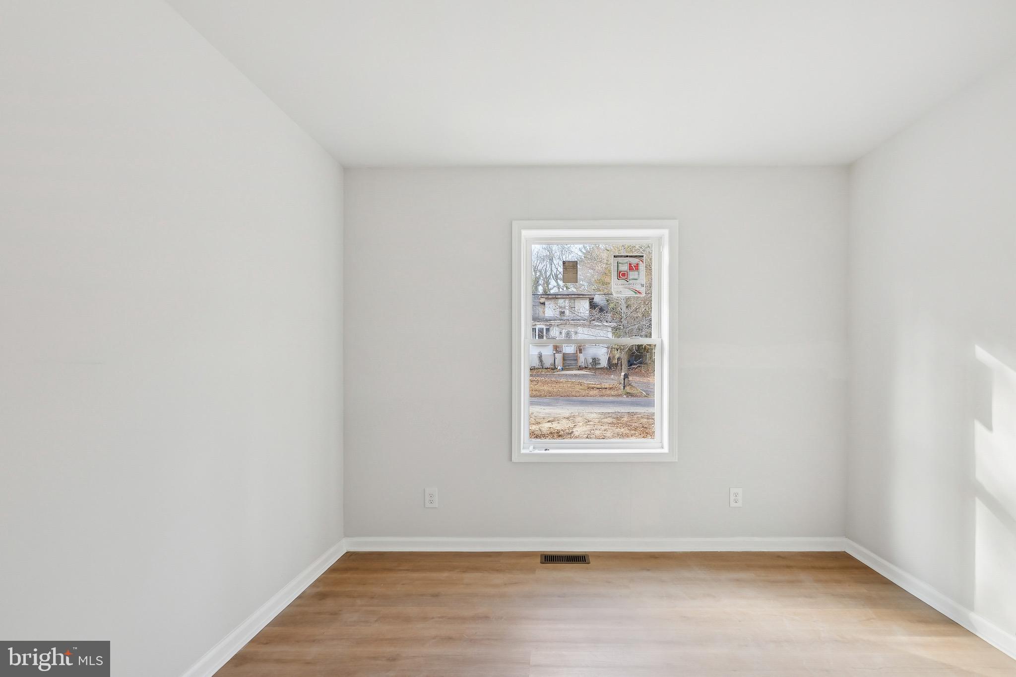 47 Highland Avenue Clementon, NJ 08021 - Photo 17 of 19 an empty room with a window