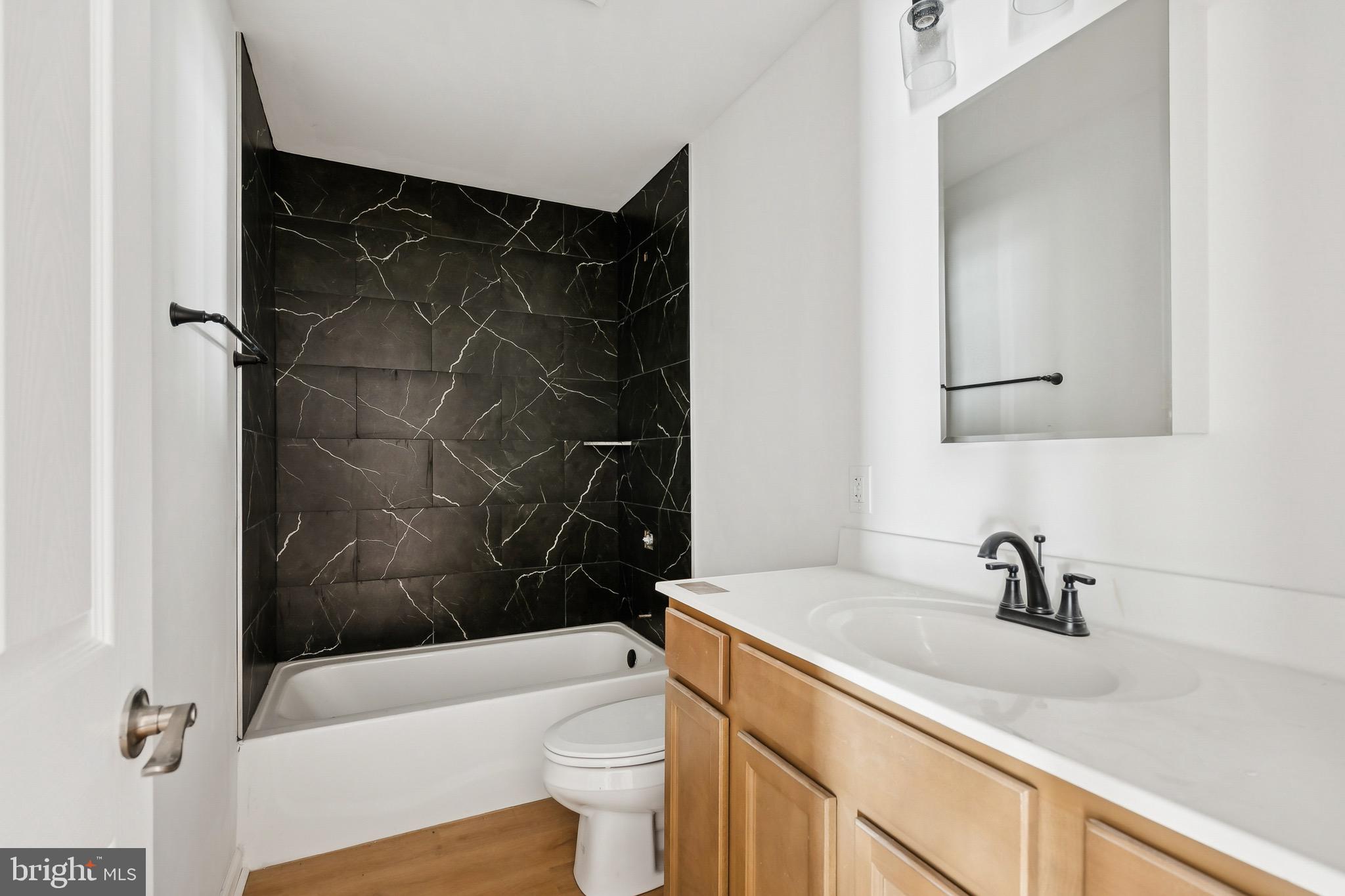 47 Highland Avenue Clementon, NJ 08021 - Photo 19 of 19 a bathroom with a sink toilet and shower