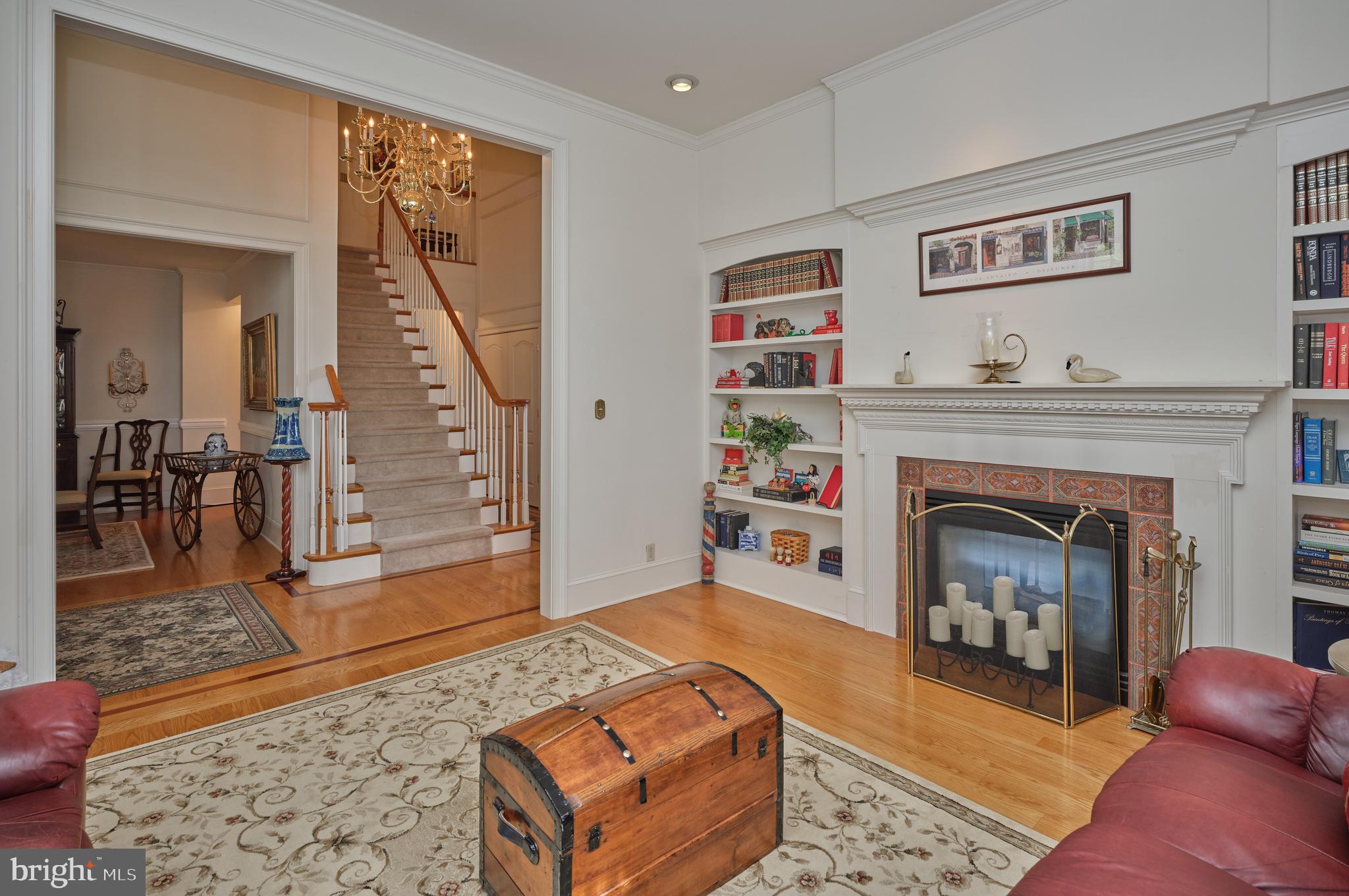 137 Wells Road Doylestown, PA 18901 - Photo 11 of 54 a living room with furniture and a fireplace