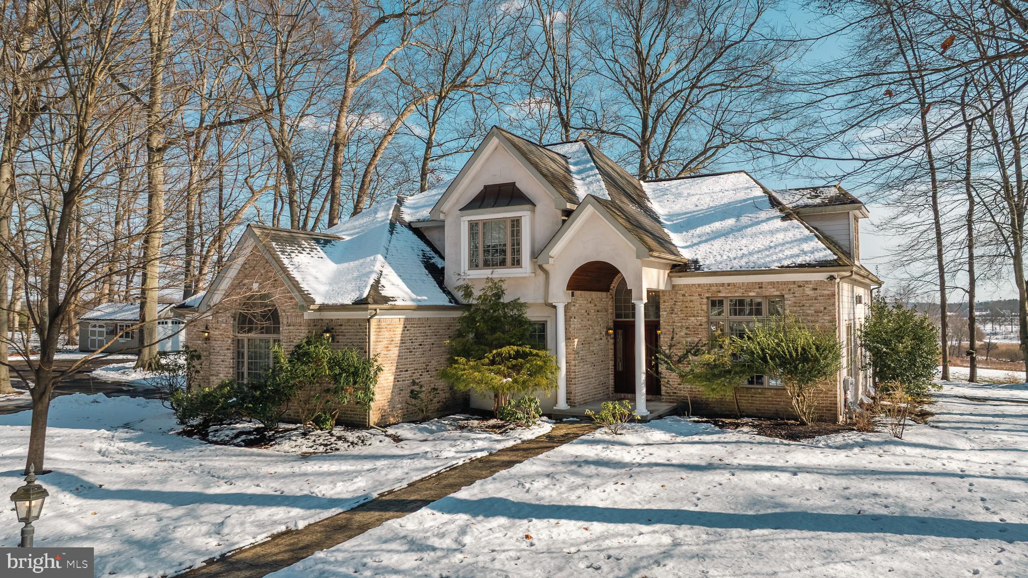 137 Wells Road Doylestown, PA 18901 - Photo 2 of 102 a front view of a house with garden