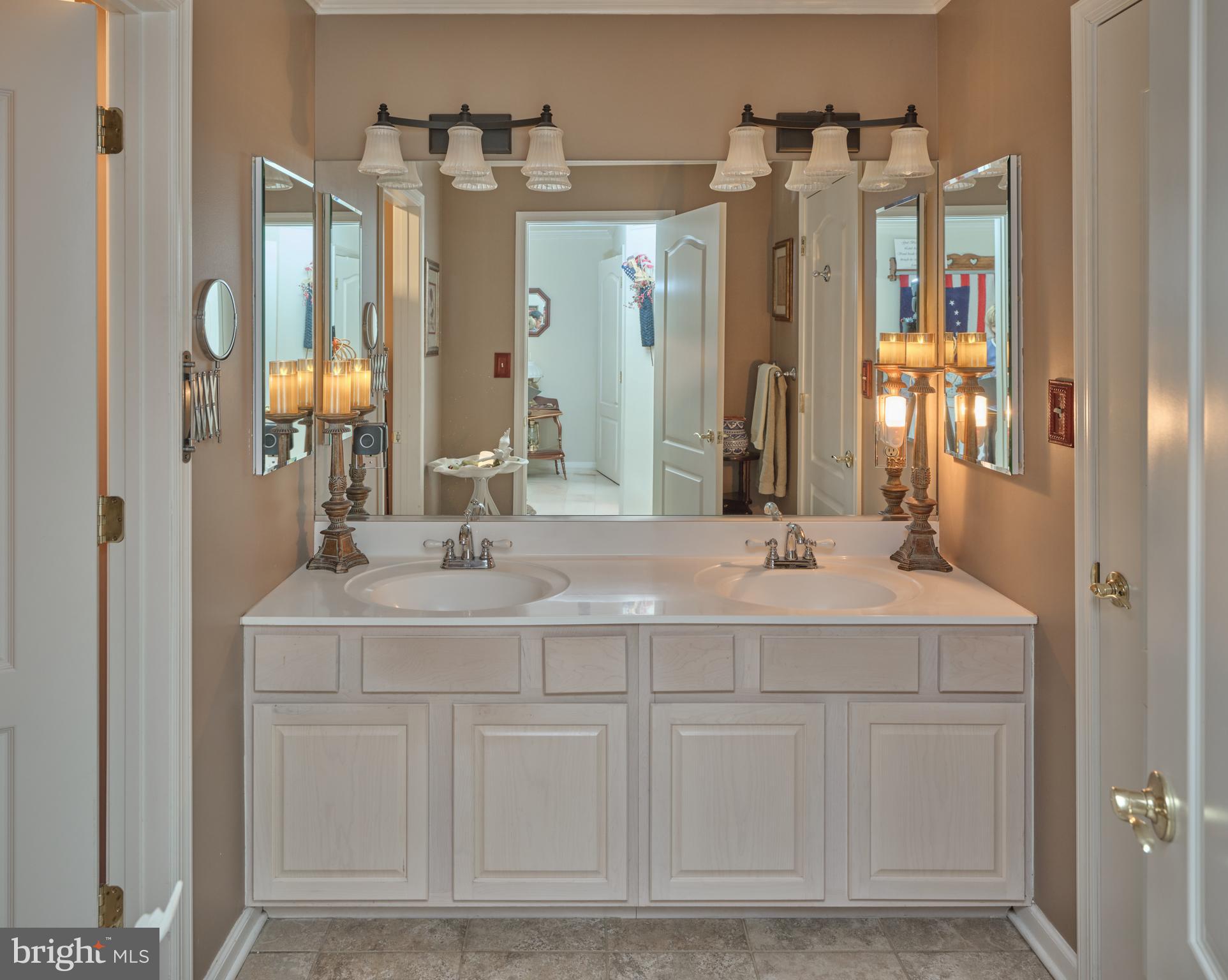 137 Wells Road Doylestown, PA 18901 - Photo 31 of 54 a bathroom with a double vanity sink and a mirror