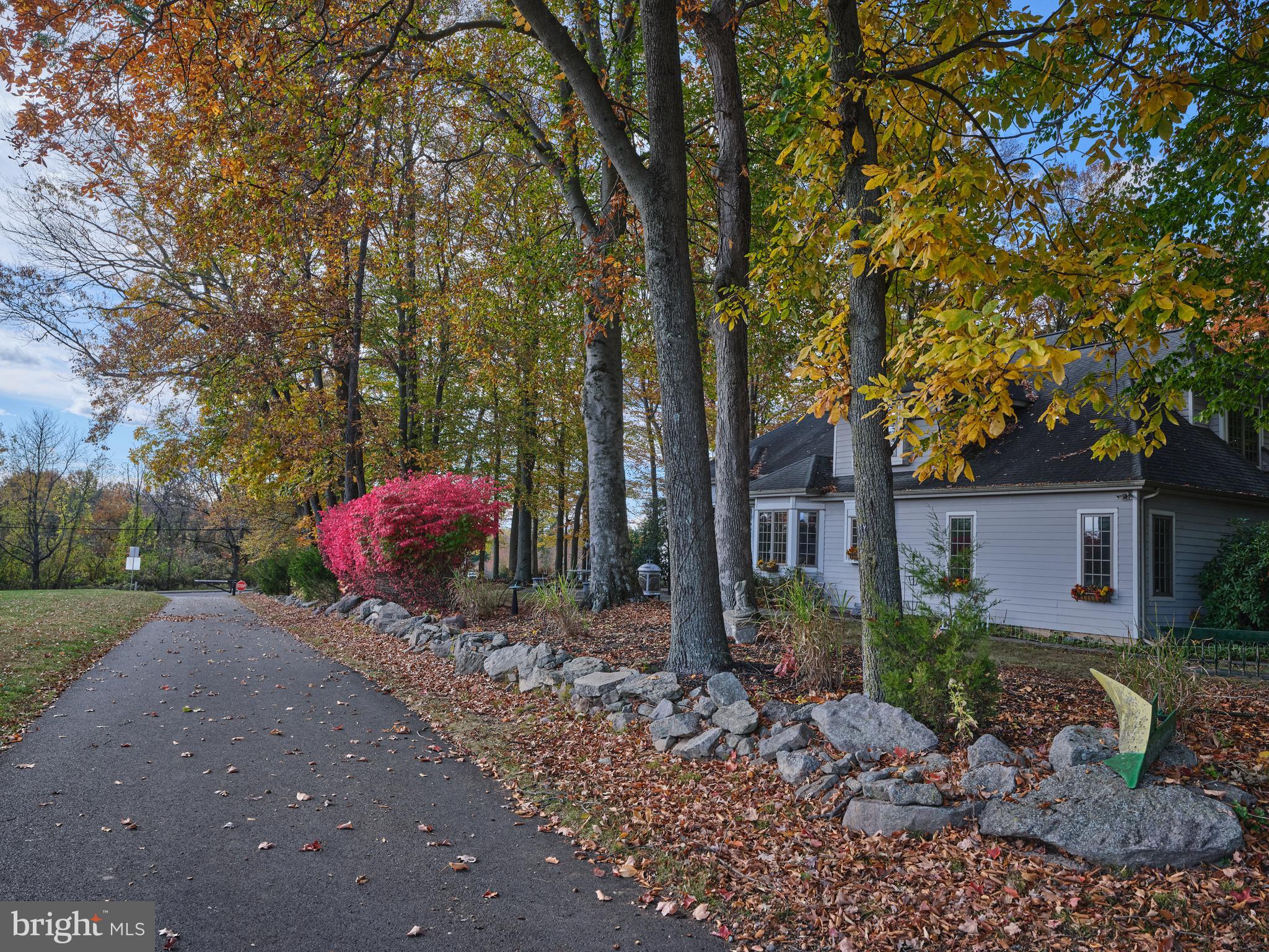 137 Wells Road Doylestown, PA 18901 - Photo 41 of 54 a view of a house with a yard and tree s