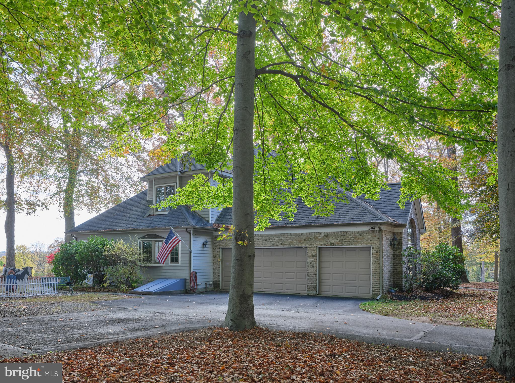 137 Wells Road Doylestown, PA 18901 - Photo 44 of 54 a front view of a house with garden