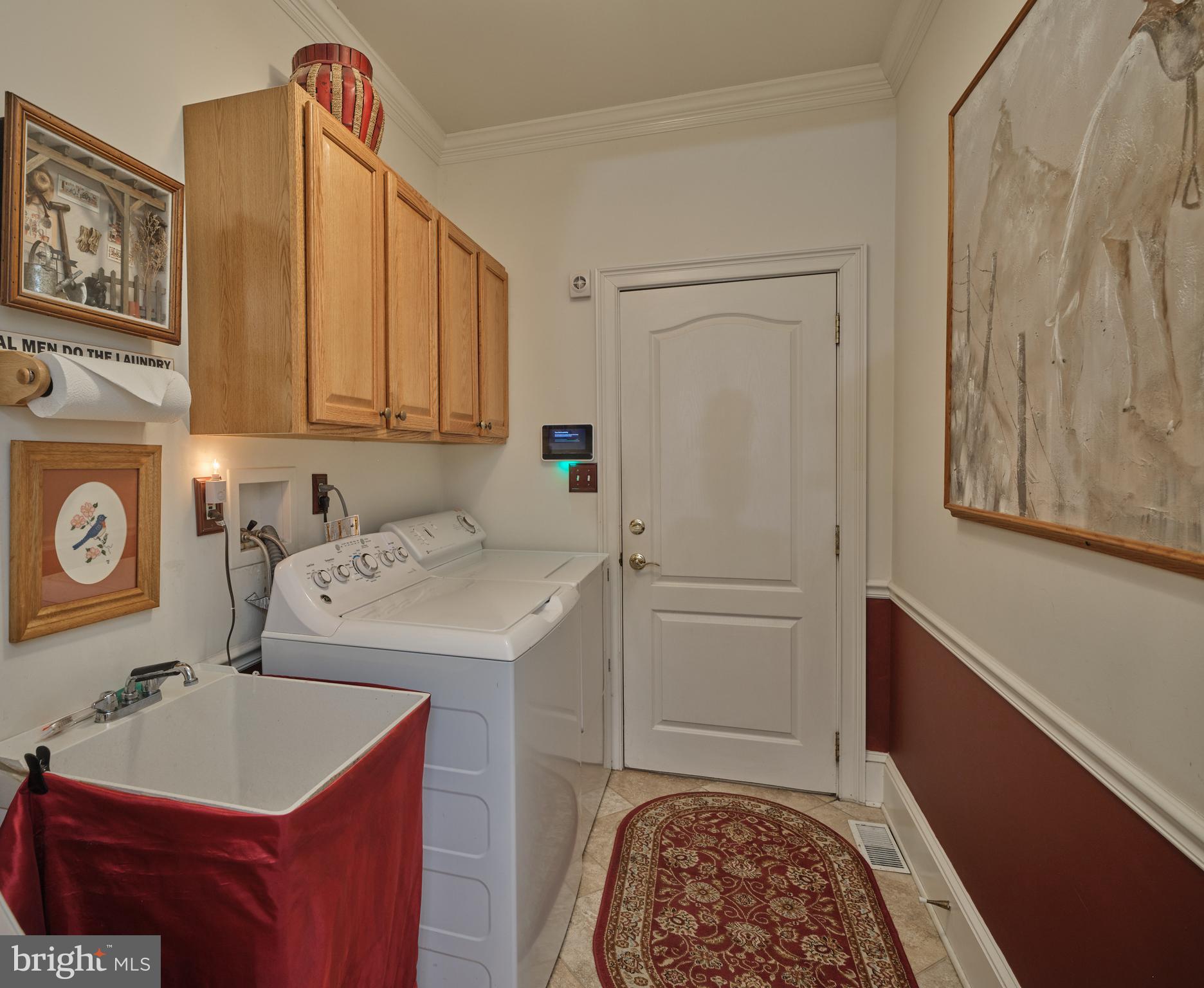 137 Wells Road Doylestown, PA 18901 - Photo 47 of 102 a utility room with a sink a washer and dryer