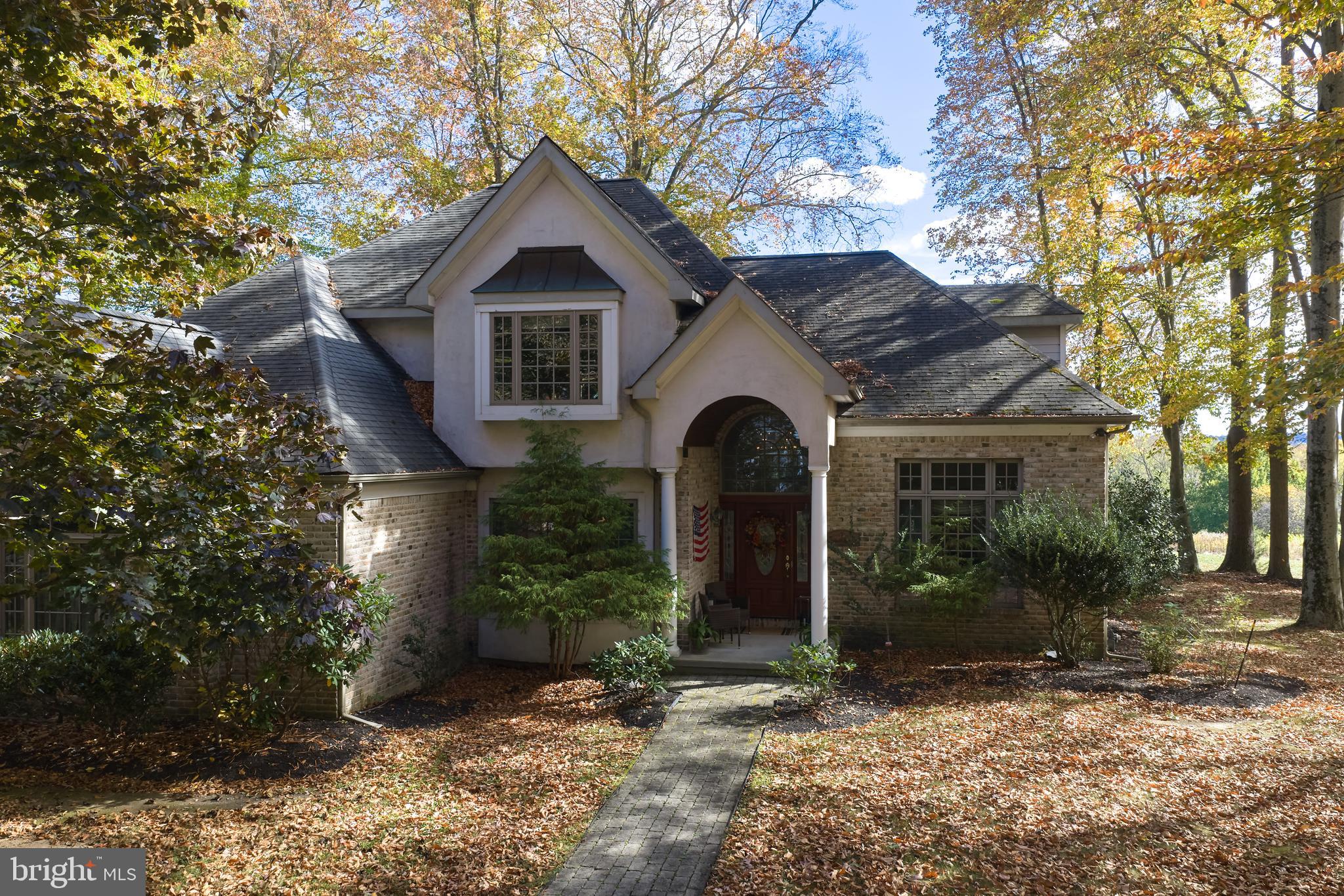 137 Wells Road Doylestown, PA 18901 - Photo 5 of 102 a front view of a house with garden