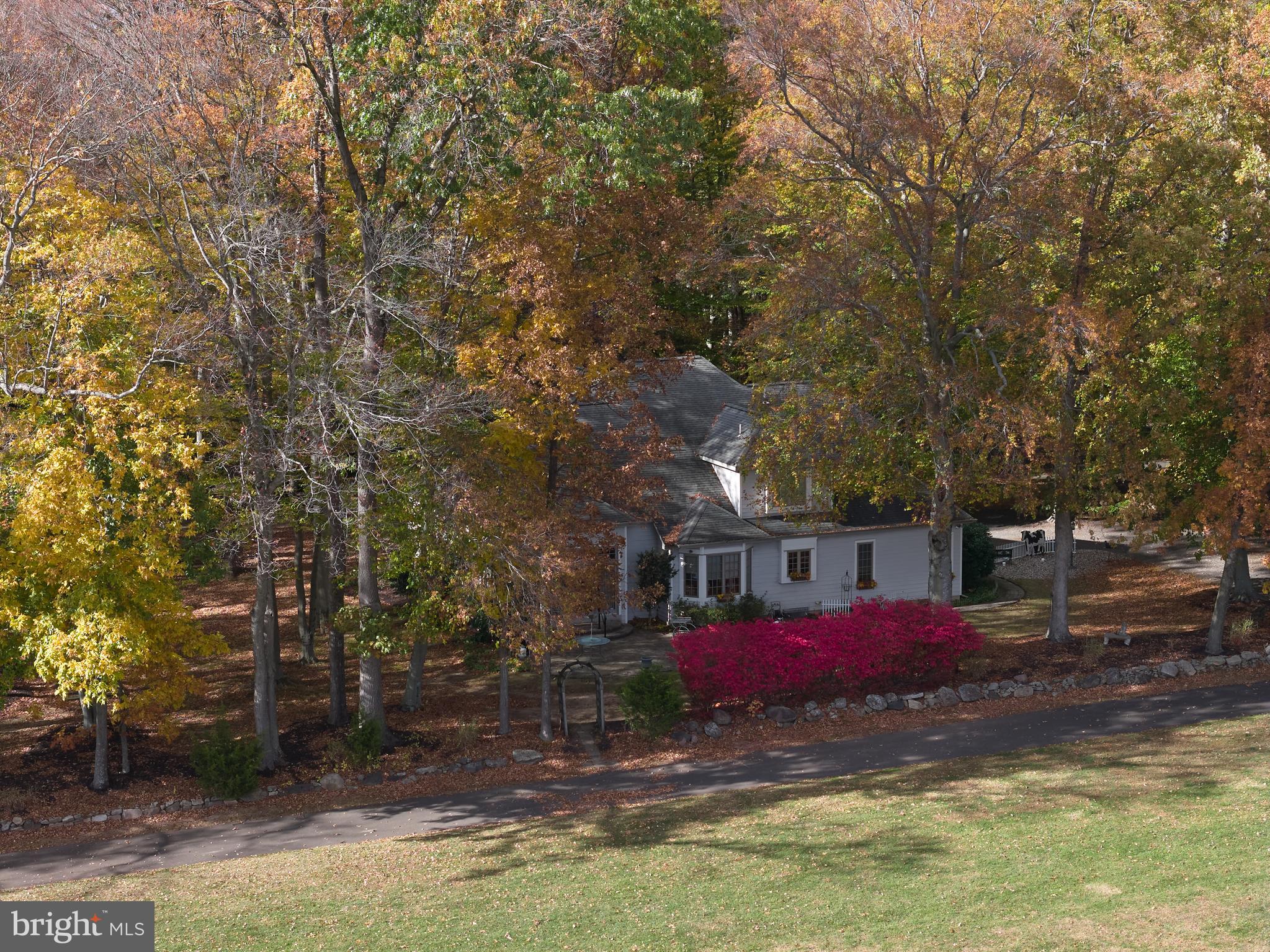 137 Wells Road Doylestown, PA 18901 - Photo 53 of 54 a view of house with swimming pool and sitting area