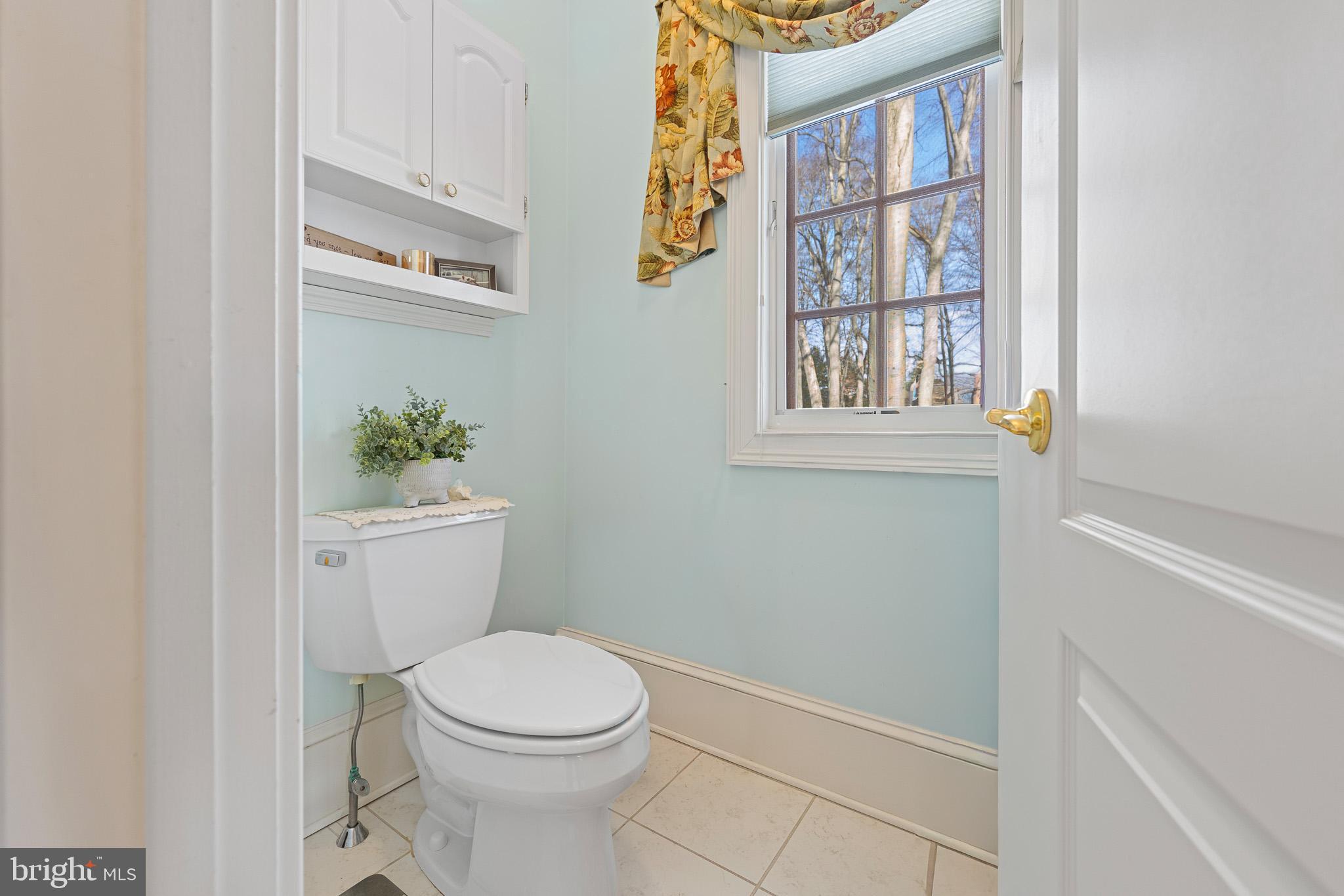 137 Wells Road Doylestown, PA 18901 - Photo 62 of 102 a white toilet sitting next to a window